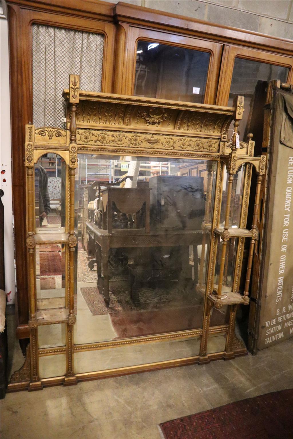 A late Victorian giltwood and gesso overmantel mirror, width 158cm, height 168cm